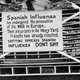 In this Oct. 19, 1918 file photo provide by the U.S. Naval History and Heritage Command a sign is posted at the Naval Aircraft Factory in Philadelphia that indicates, the Spanish Influenza was then extremely active.